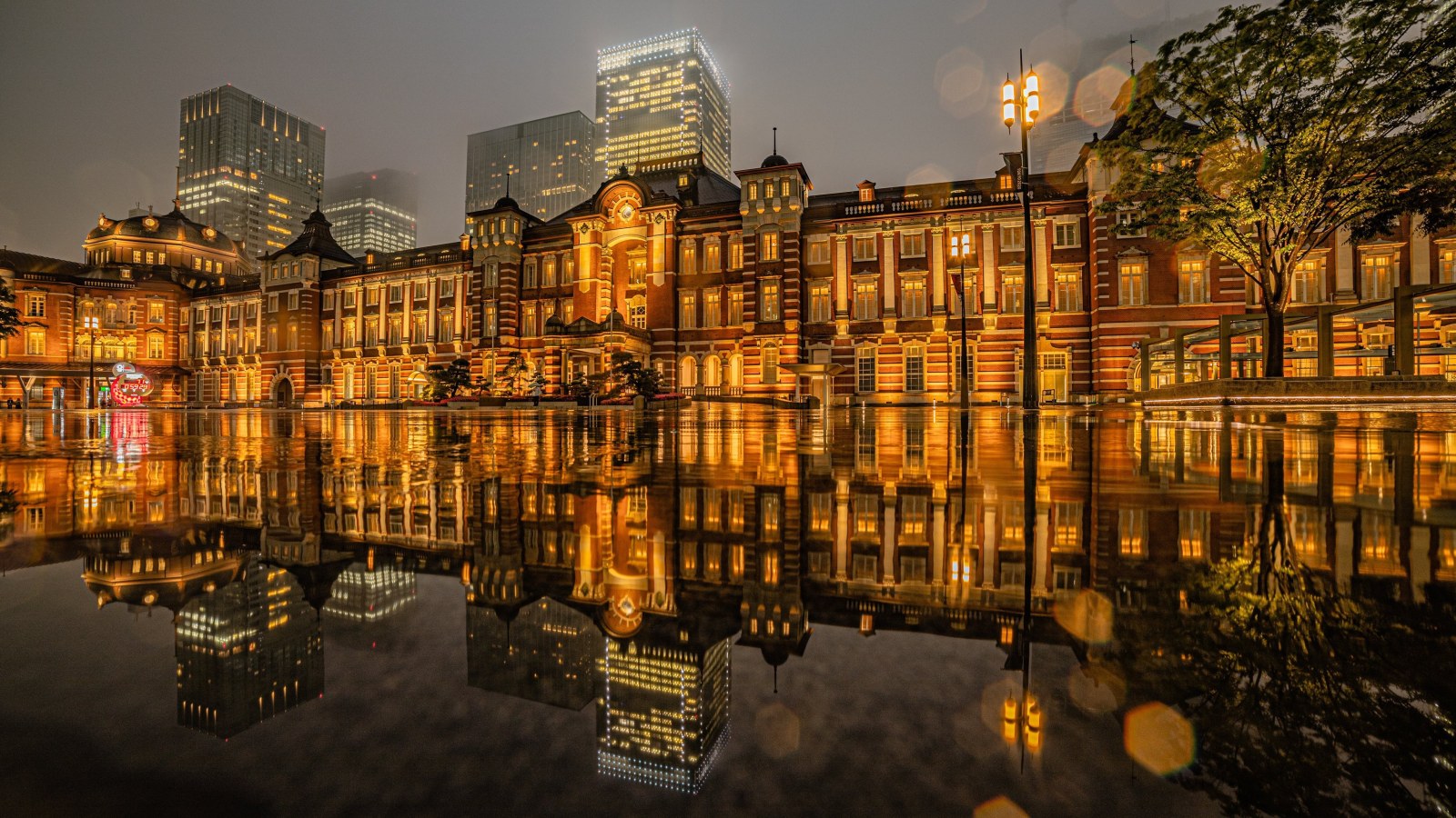 Illuminated Red-Brick Station Reflected at Night — Architecture wallpaper