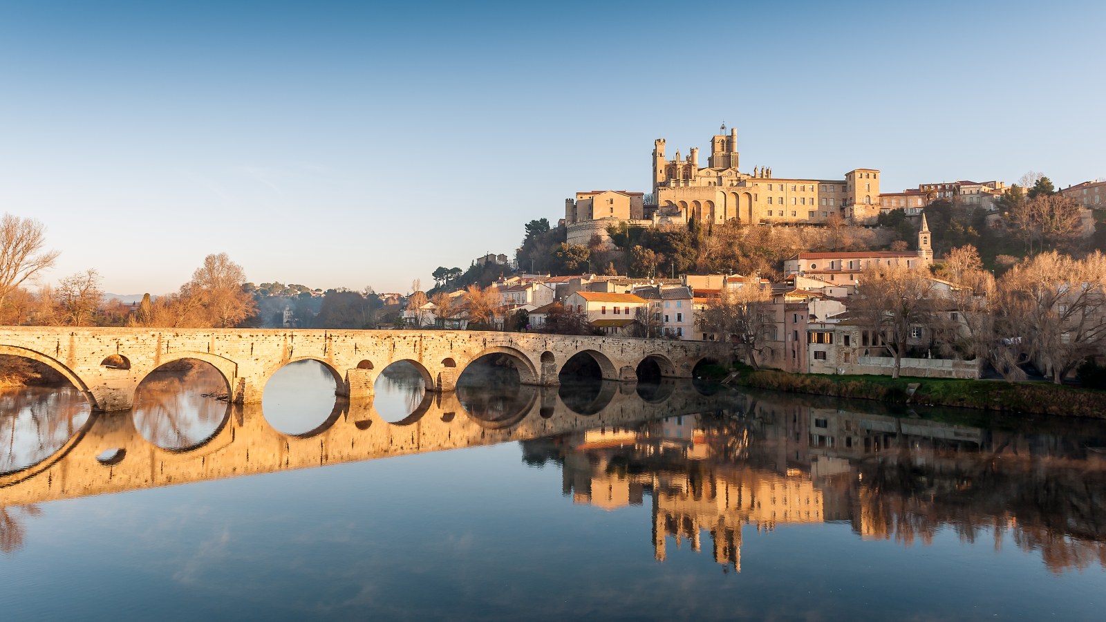 Historic Riverside City and Stone Bridge 4K Wallpaper — City wallpaper