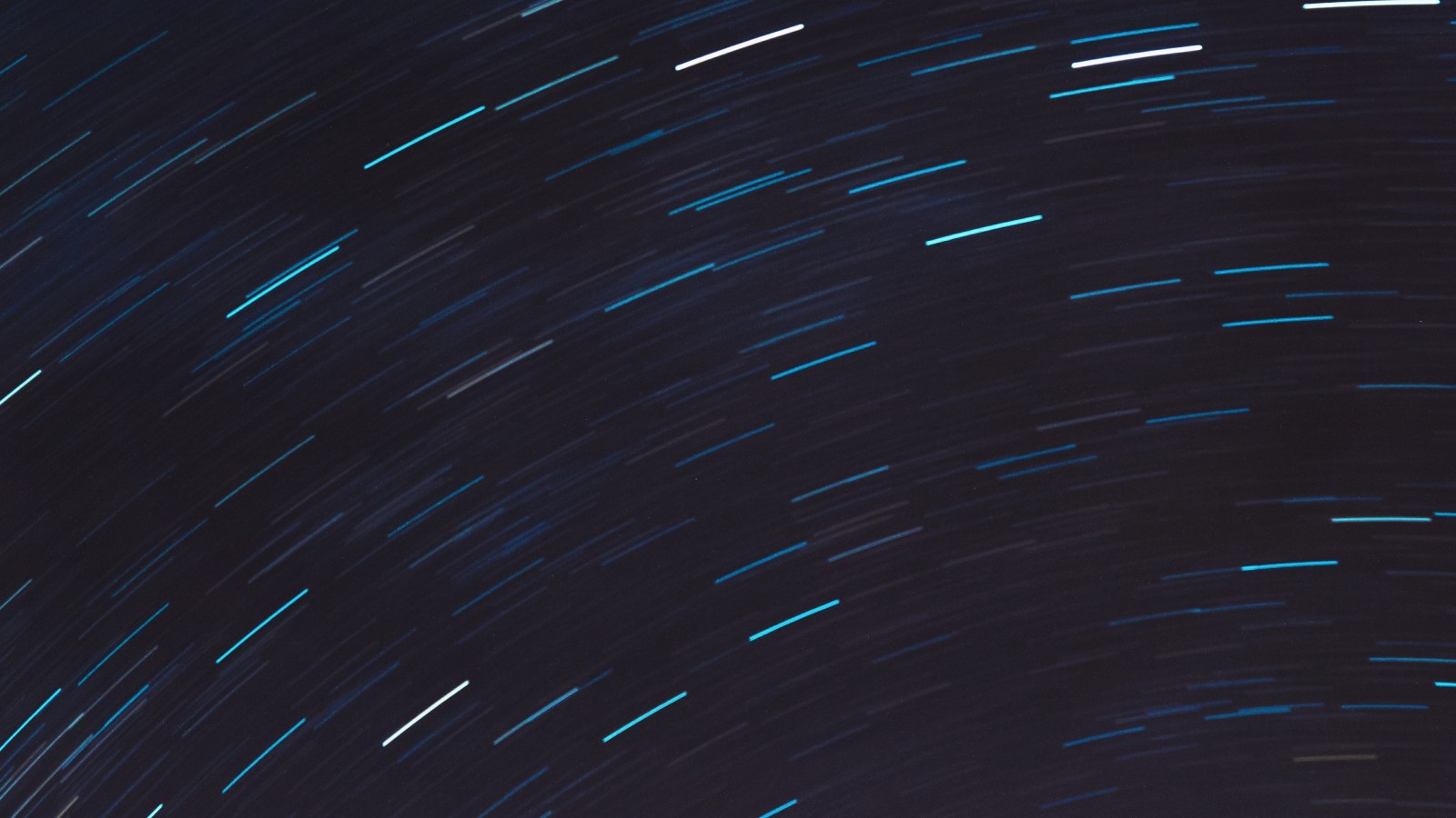Dark Star Trails in Navy Tones — Night Sky wallpaper