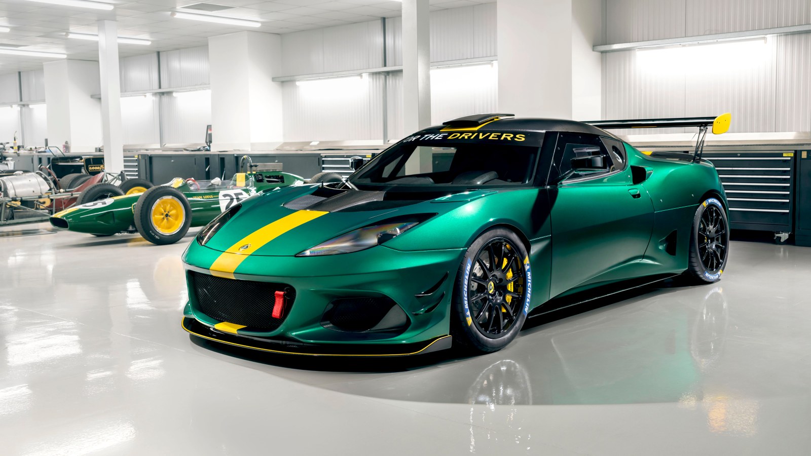 Green Lotus in a Racing Garage — Cars wallpaper