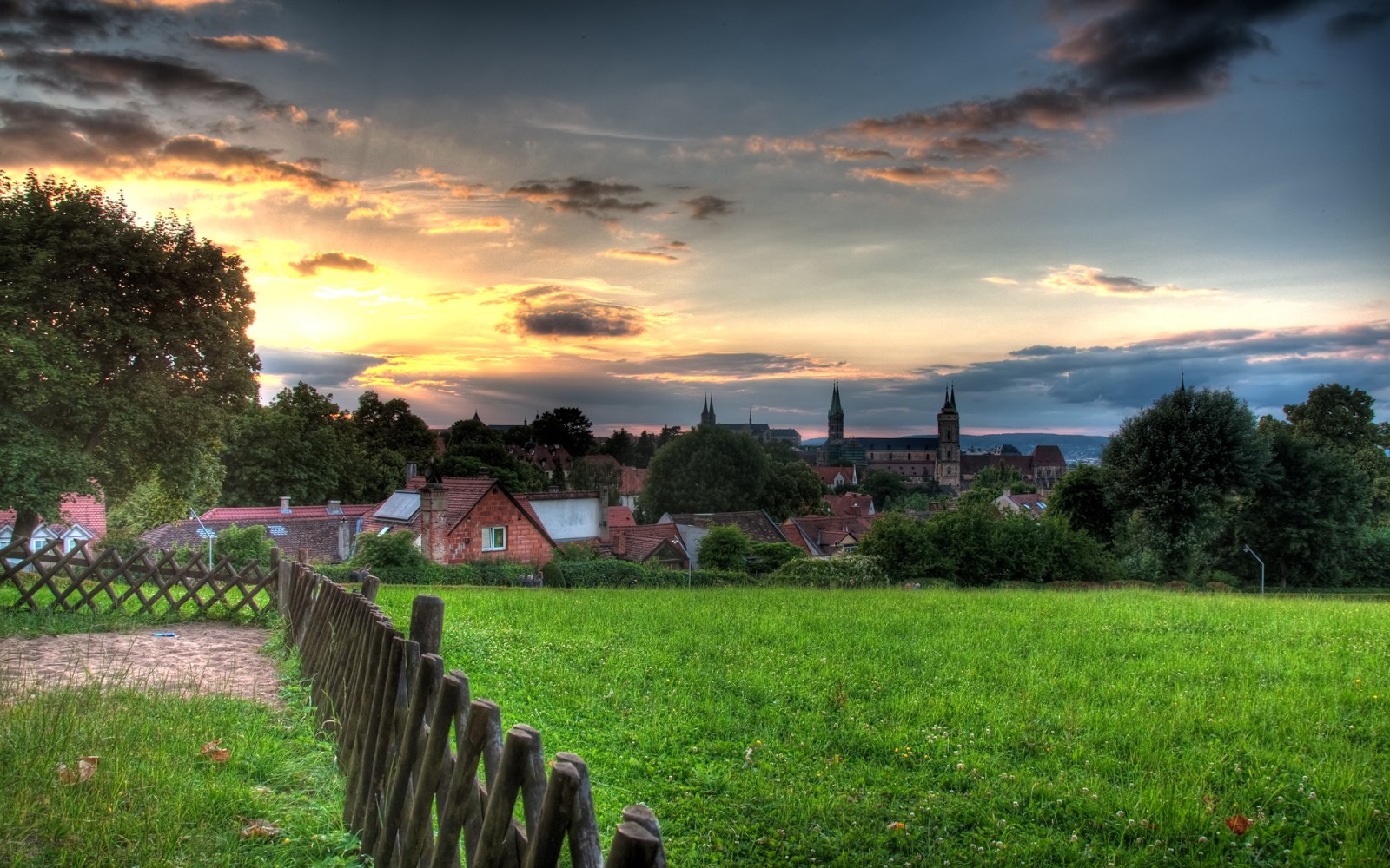 Village and Green Field at Sunset Wallpaper — Nature wallpaper