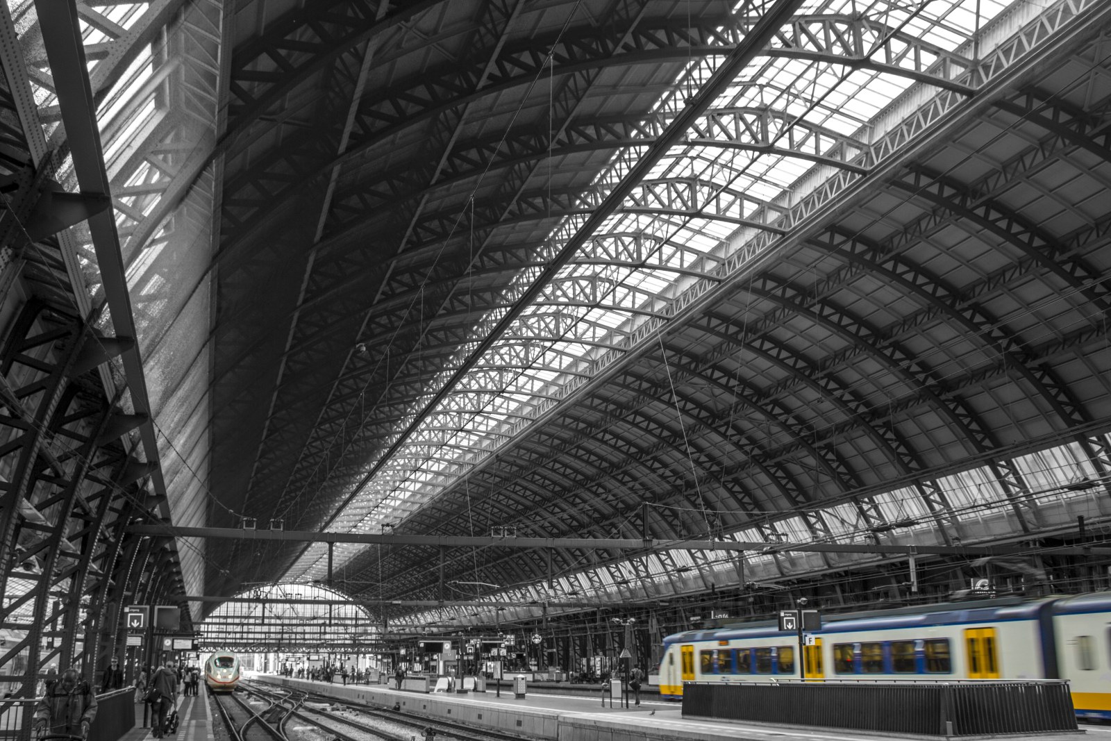 Yellow-Accented Train Beneath a Steel Station Roof — Architecture wallpaper