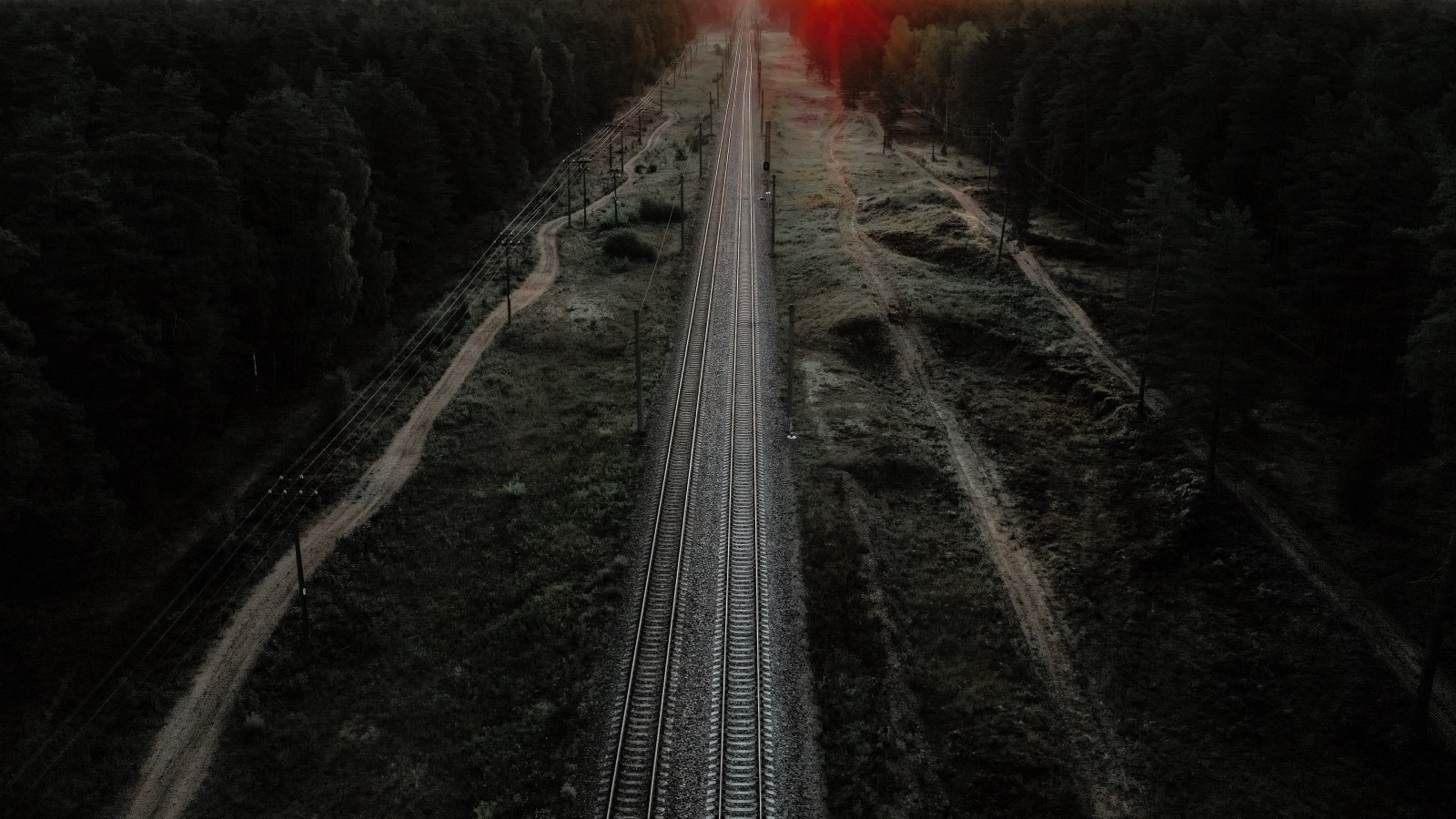 Railway Tracks Through a Forest at Sunset — Trains wallpaper
