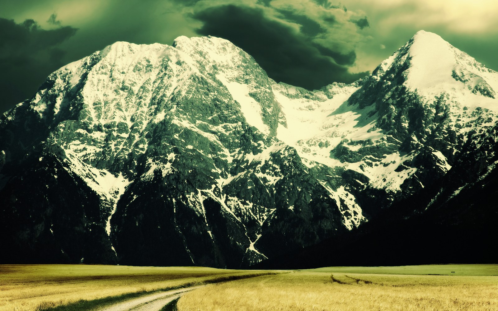 Snowy Mountain Range Above a Meadow Wallpaper — Nature wallpaper