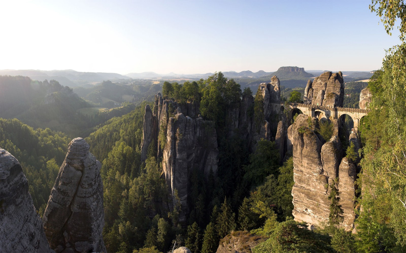 Rock Towers Above a Forested Valley Wallpaper — Nature wallpaper