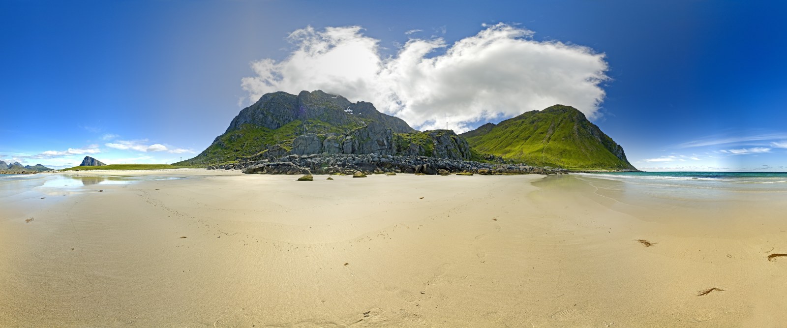 Green Hill Above a Sandy Beach — Ocean & Beach wallpaper