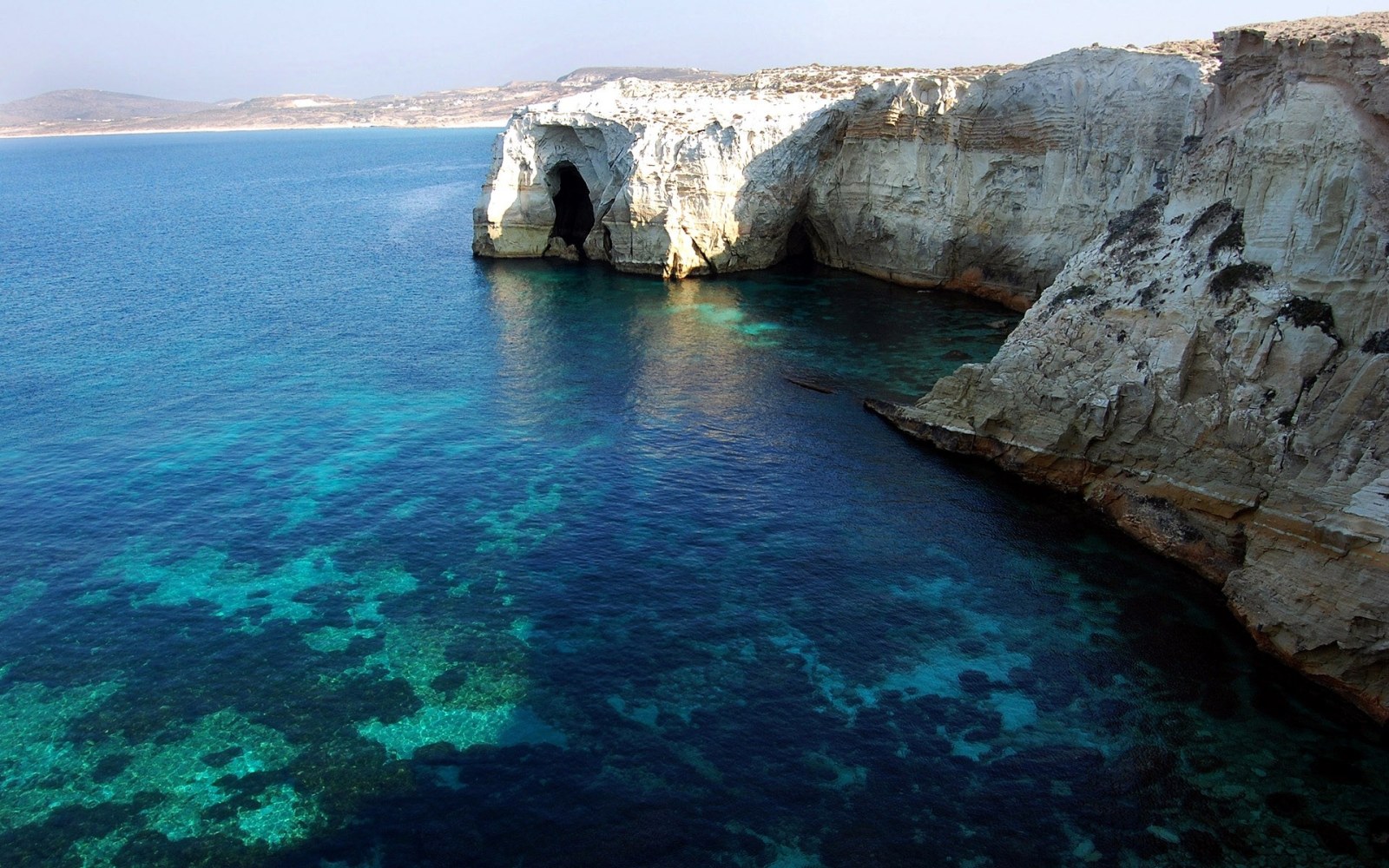 White Coastal Cliffs Above Clear Water Wallpaper — Nature wallpaper