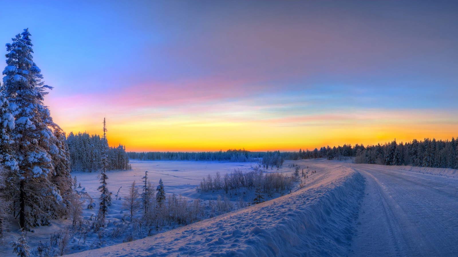 Snowy Road at Winter Sunset 4K Wallpaper — Nature wallpaper
