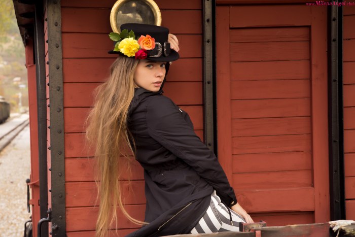 Floral Top Hat Portrait Beside a Red Railcar — People / Portraits wallpaper