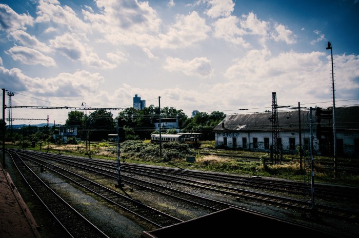 Railway Yard Beneath a Cloudy Sky — Trains wallpaper