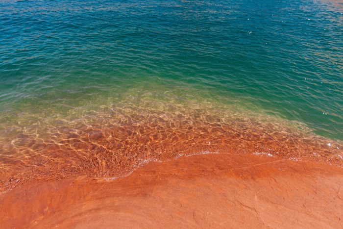 Turquoise Water Meets Red Sand — Ocean & Beach wallpaper