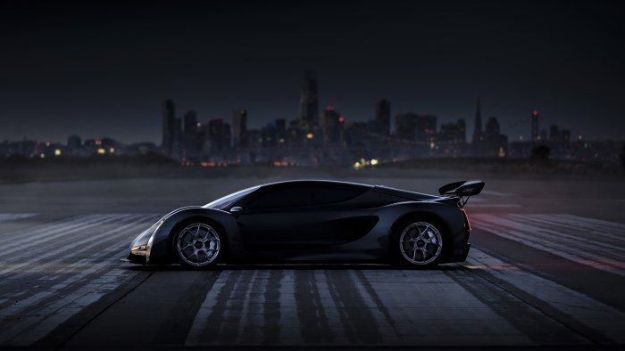 Black Supercar over a Night Skyline — Cars wallpaper