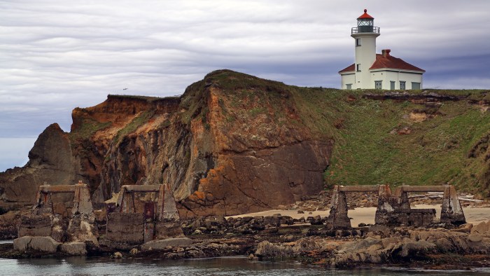 Clifftop Lighthouse Above the Sea 4K Wallpaper — Nature wallpaper