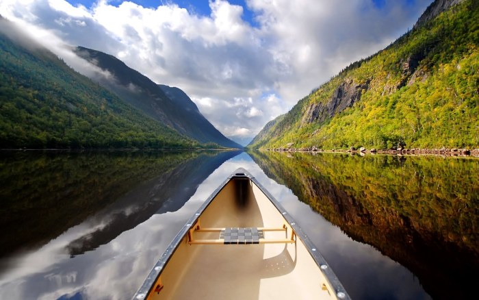 Canoe on a Calm Mountain Lake Wallpaper — Nature wallpaper