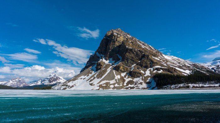 Snowy Mountain Above an Icy Lake Wallpaper — Nature wallpaper