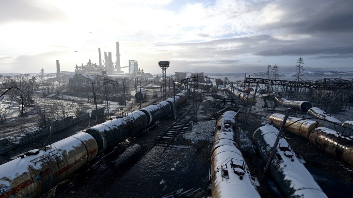 Snow-Dusted Tanker Wagons in an Industrial Rail Yard — Trains wallpaper