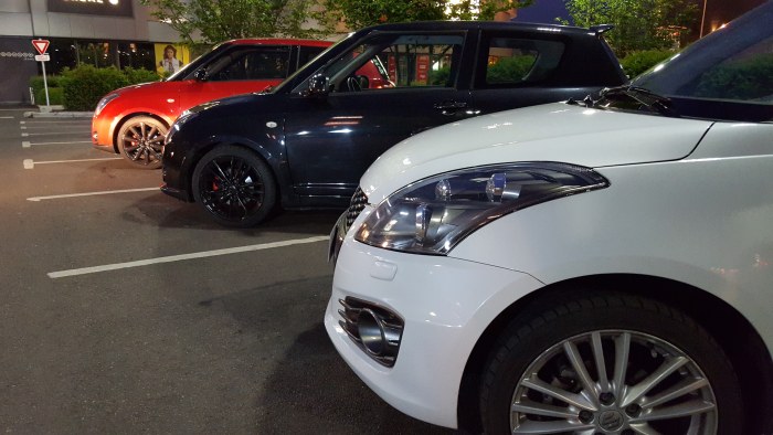 White Hatchback in an Evening Lot — Cars wallpaper