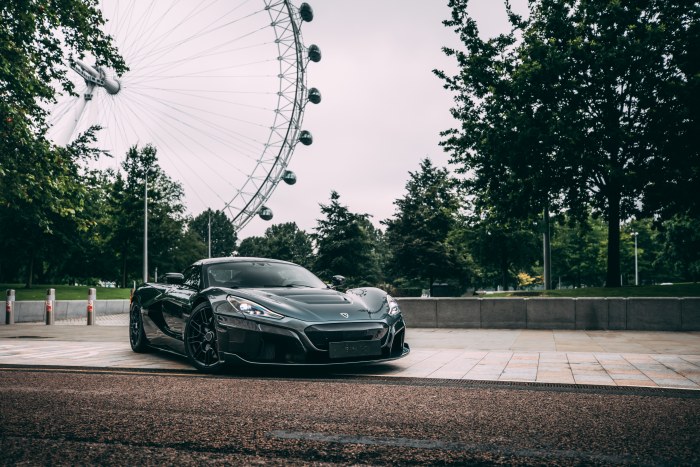 Dark Supercar by a Ferris Wheel — Cars wallpaper
