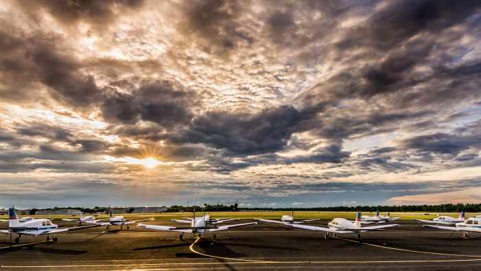 Storm Clouds Over an Airfield 4K Wallpaper — City wallpaper