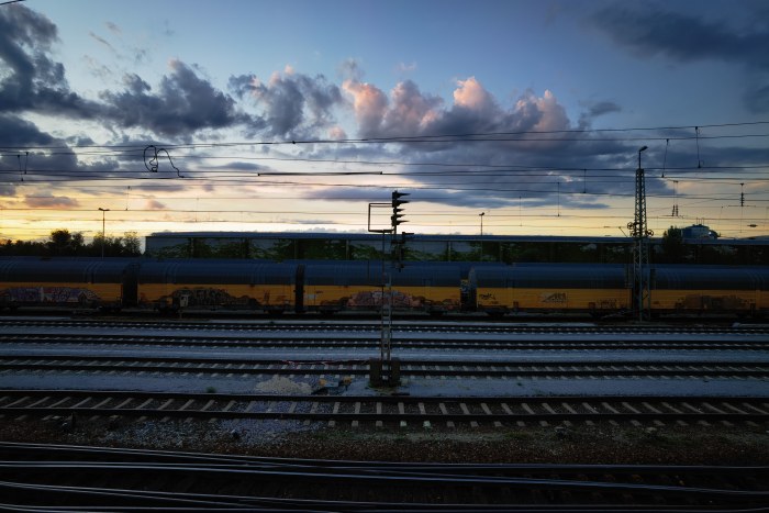 Cool-Toned Landscape 4K Wallpaper — Trains wallpaper