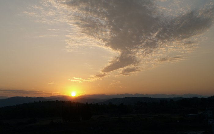 Sunset Over Distant Rolling Hills Wallpaper — Nature wallpaper