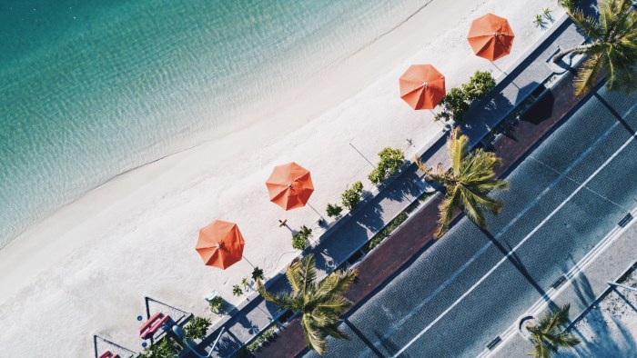 Red Beach Umbrellas from Above — Ocean & Beach wallpaper