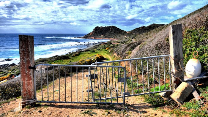 Rustic Gate Above a Rocky Coast Wallpaper — Nature wallpaper